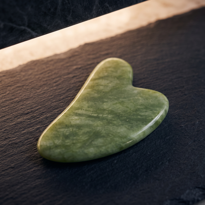 Green stone gua sha close-up