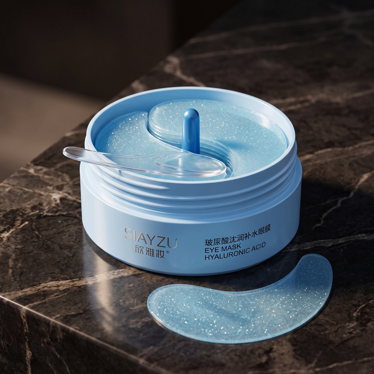 Under-eye patches jar on dark marble